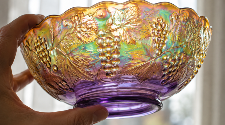 Illustration of checking carnival glass base color near the foot where iridescent coating is thinnest