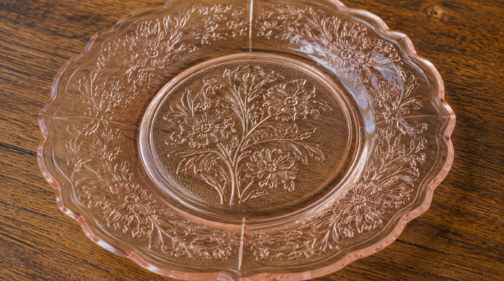 Illustration of a genuine pink Depression glass plate showing pattern and mold seam detail